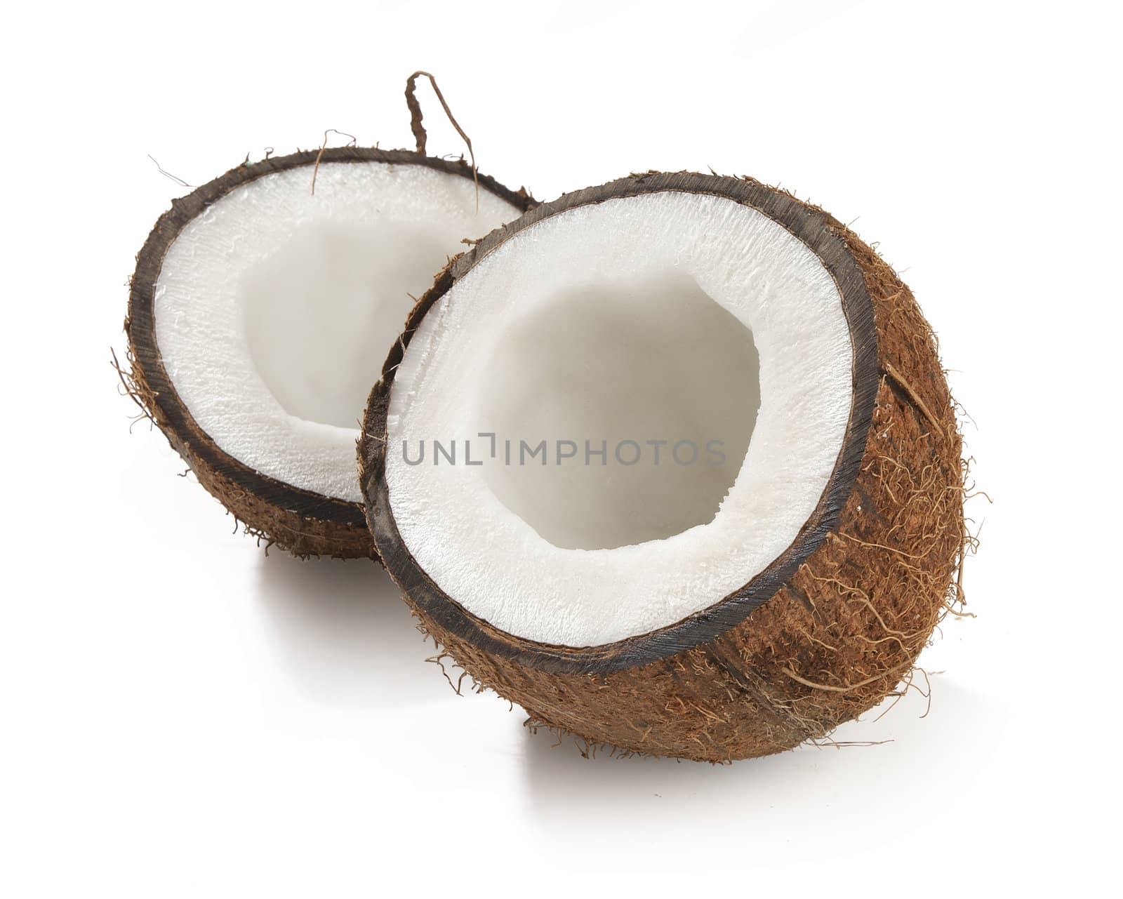 One opened coconut on the white background