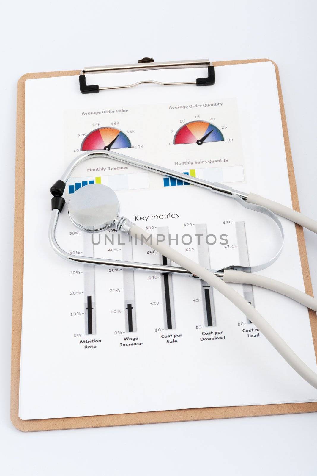 Business graph with stethoscope by raywoo