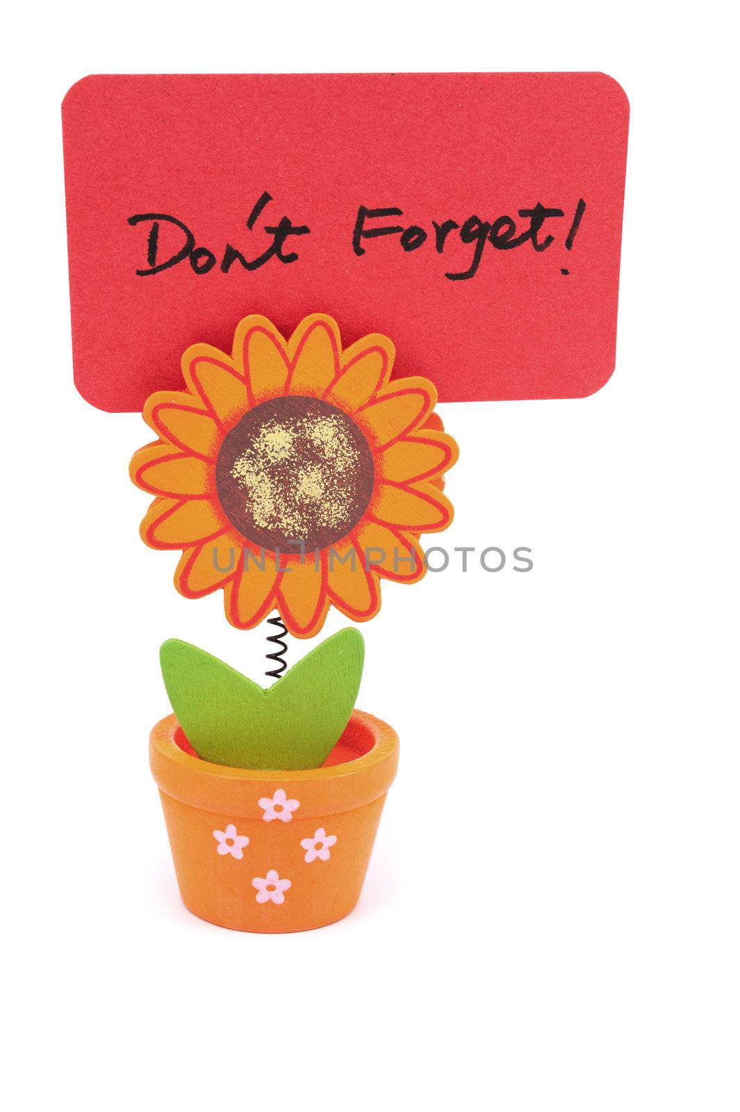 Don't forget words written on red paper of sun flower pot clip