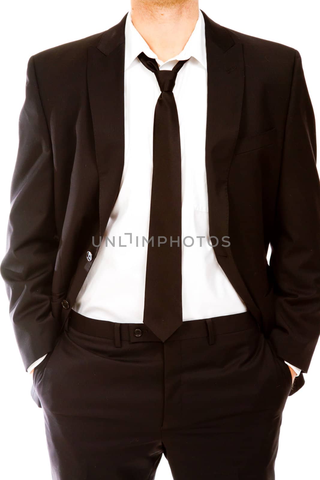 This handsome groom is isolated against a white background in the studio to create a portrait of a man that could be getting married or could be a business person.