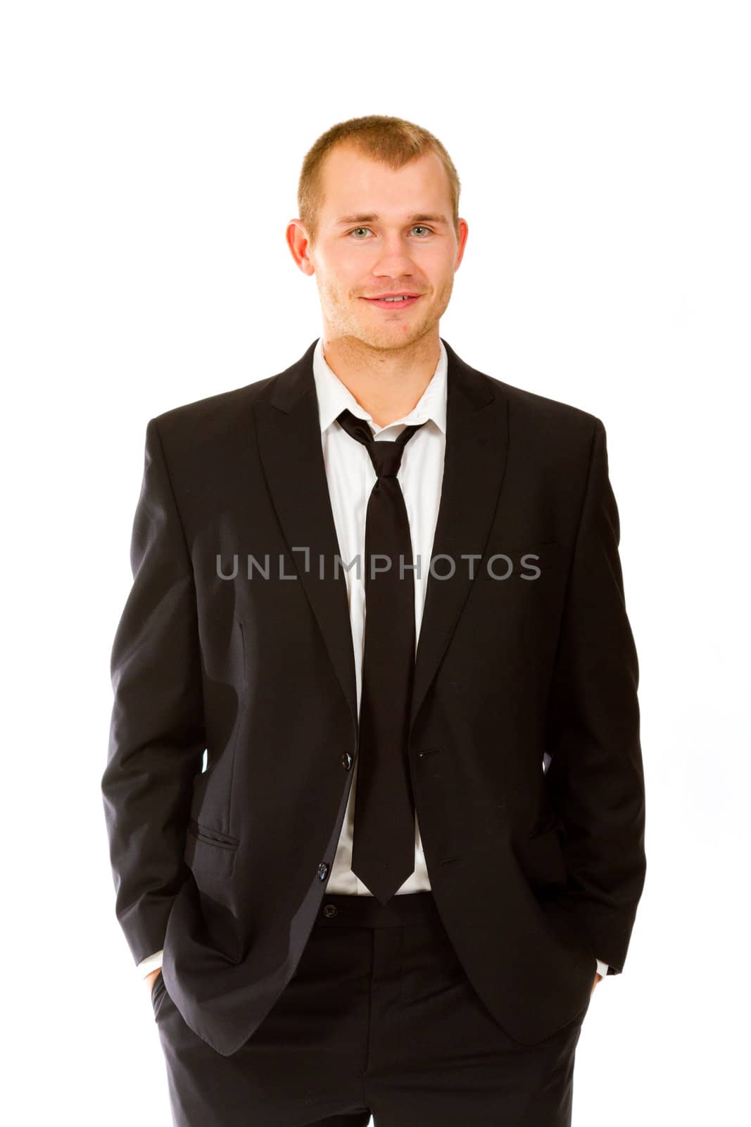 This handsome groom is isolated against a white background in the studio to create a portrait of a man that could be getting married or could be a business person.