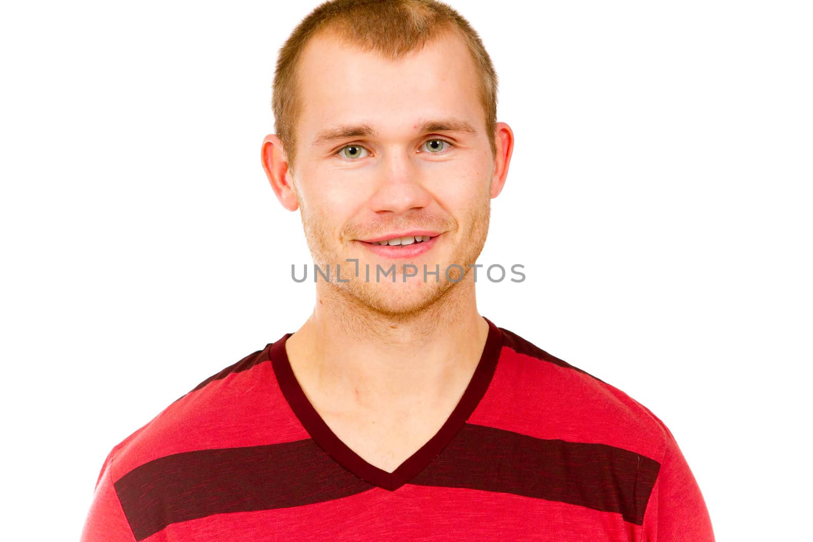 A fashion portrait of a guy in the studio against a white isolated background.