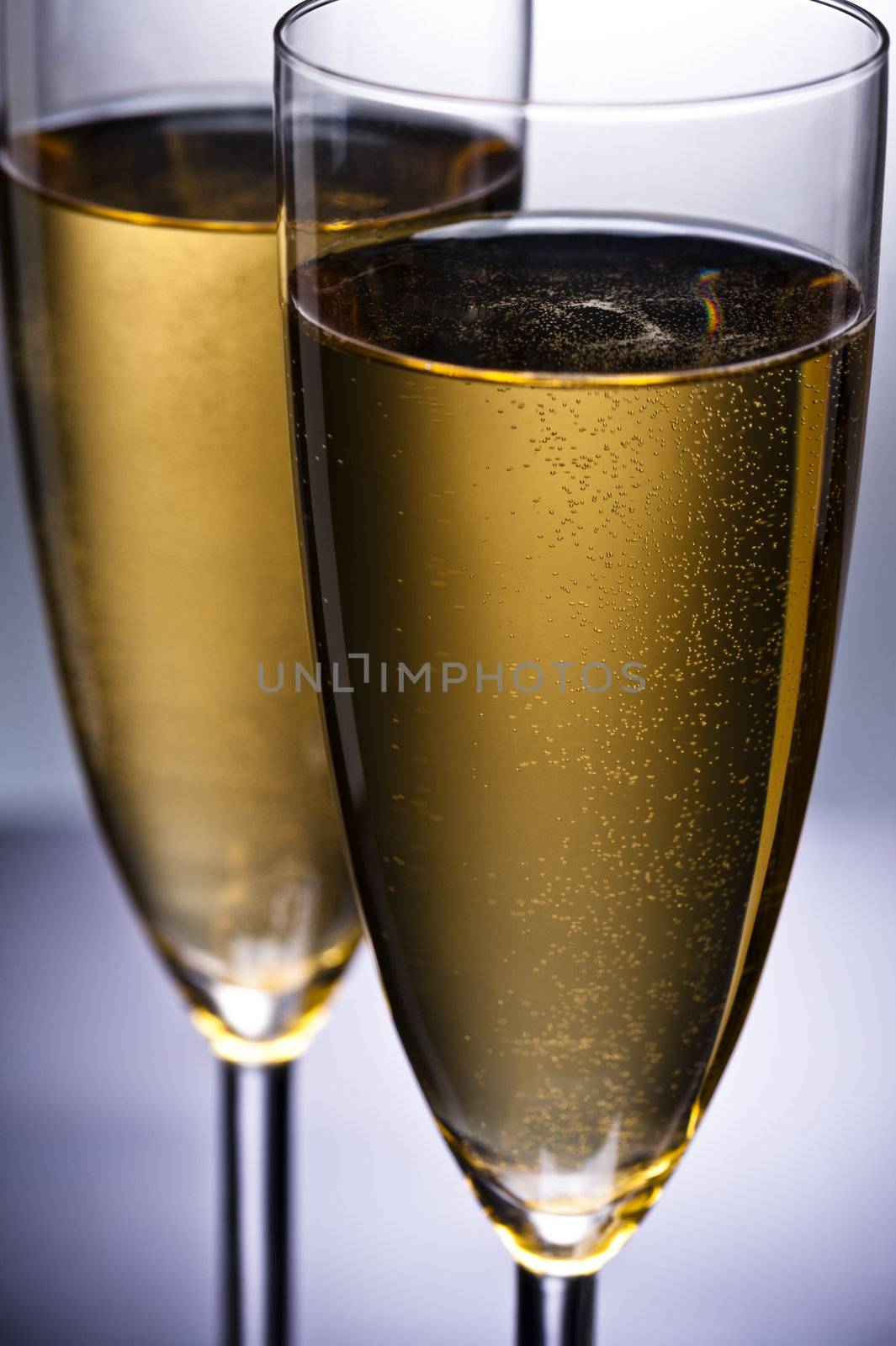 Champagne glass in front of a spotlight