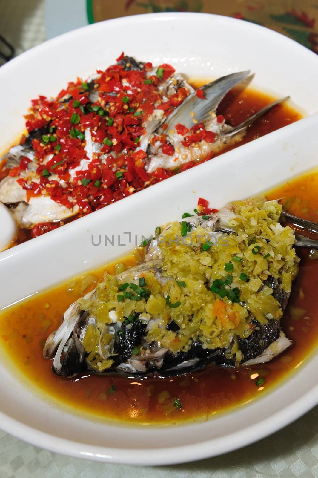 Chinese style steamed Fish head with diced hot red peppers
