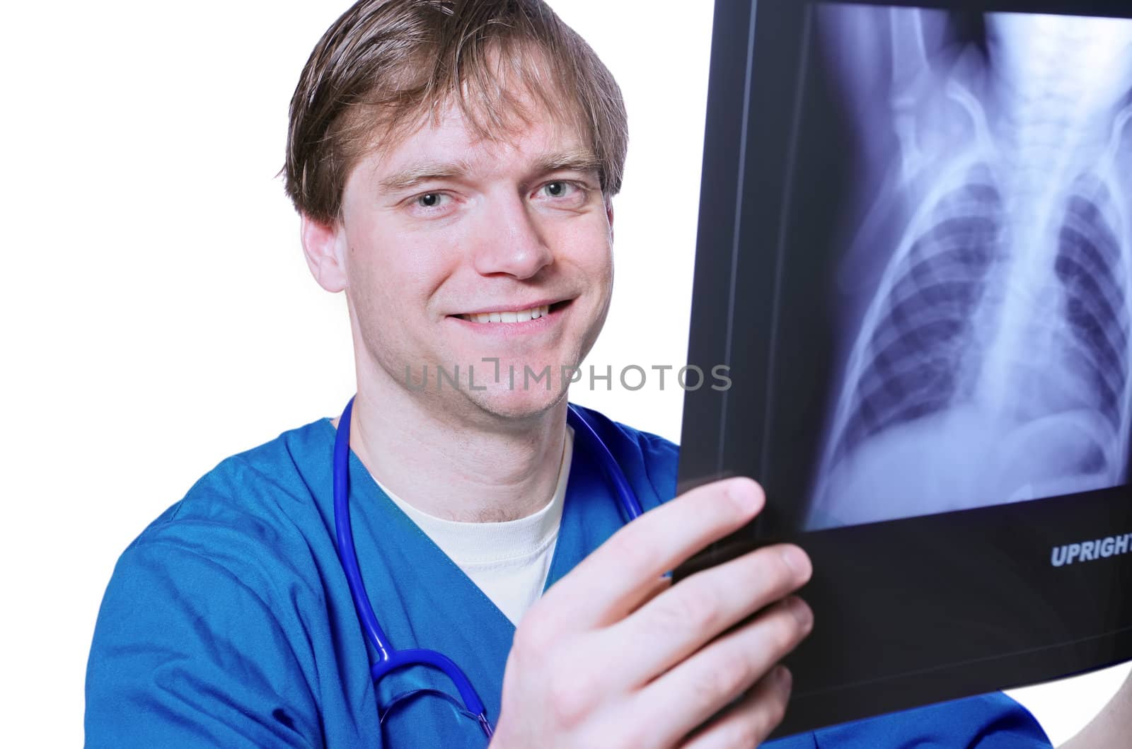 Male doctor looking at xray by jarenwicklund