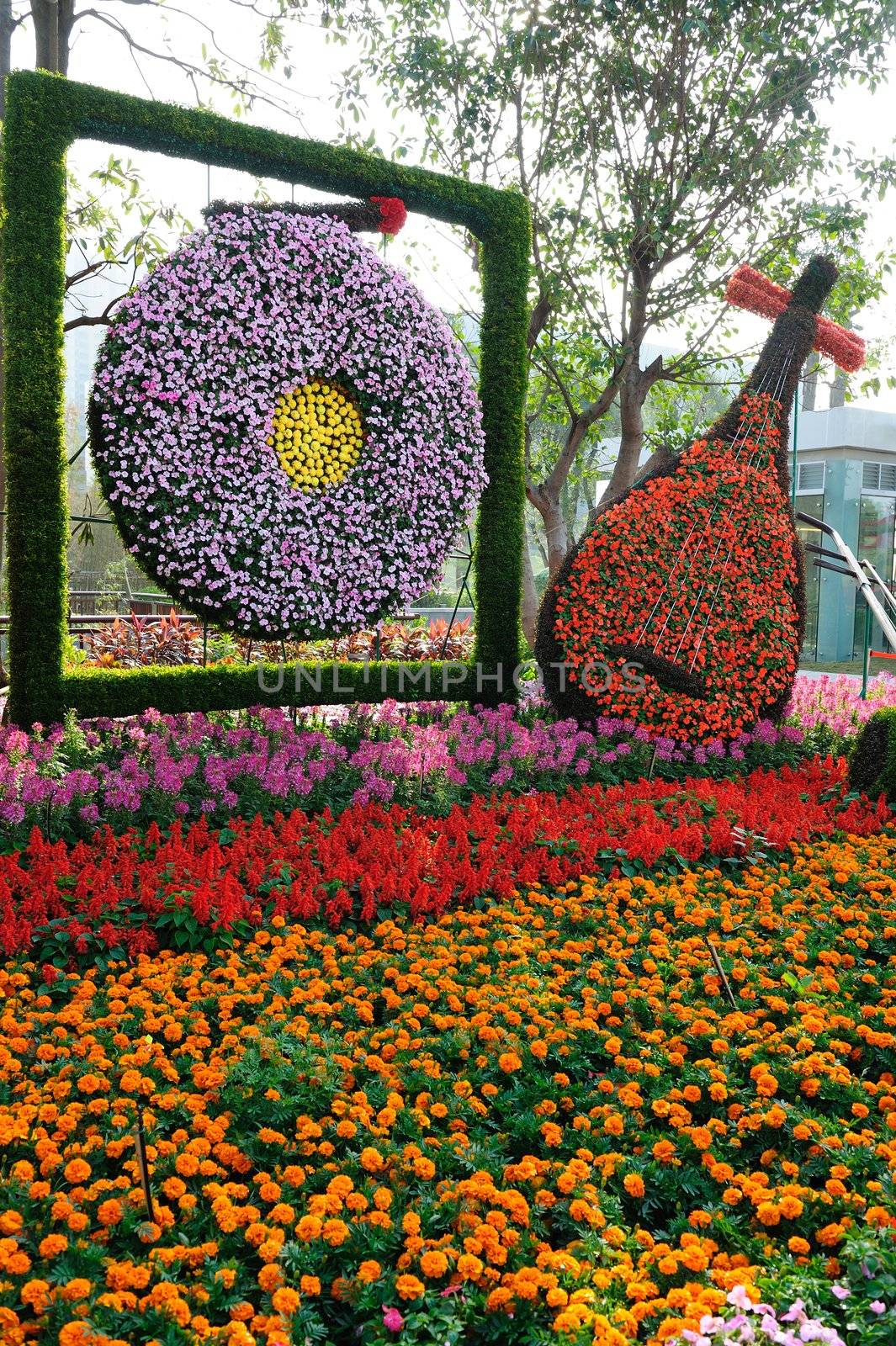 Chinese traditional musical instruments made of flowers in Flower Citizen Plaza, Guangzhou city, China