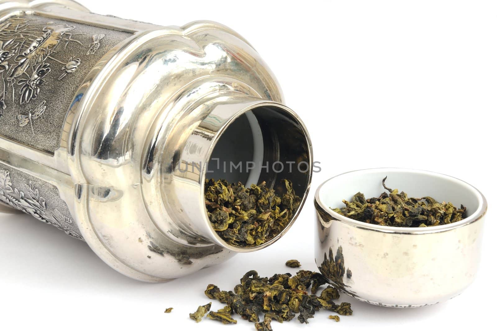 tea caddy with Tie Guanyin on the white background