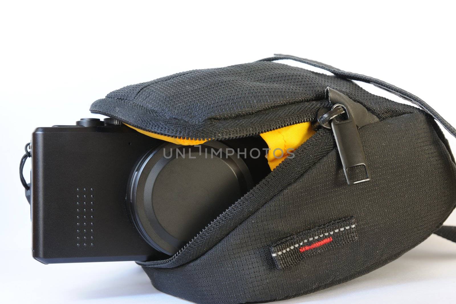 Compact digital camera in bag by raywoo