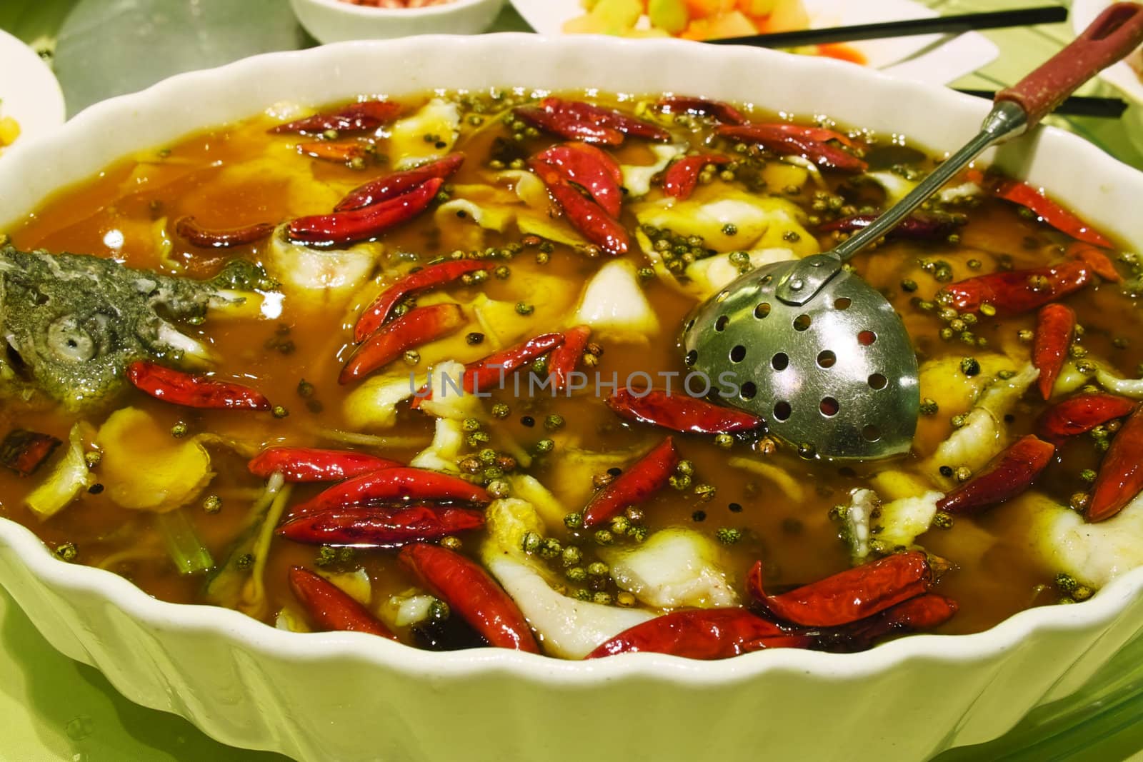Chinese Sichuan cuisine - fish filets in hot chili oil