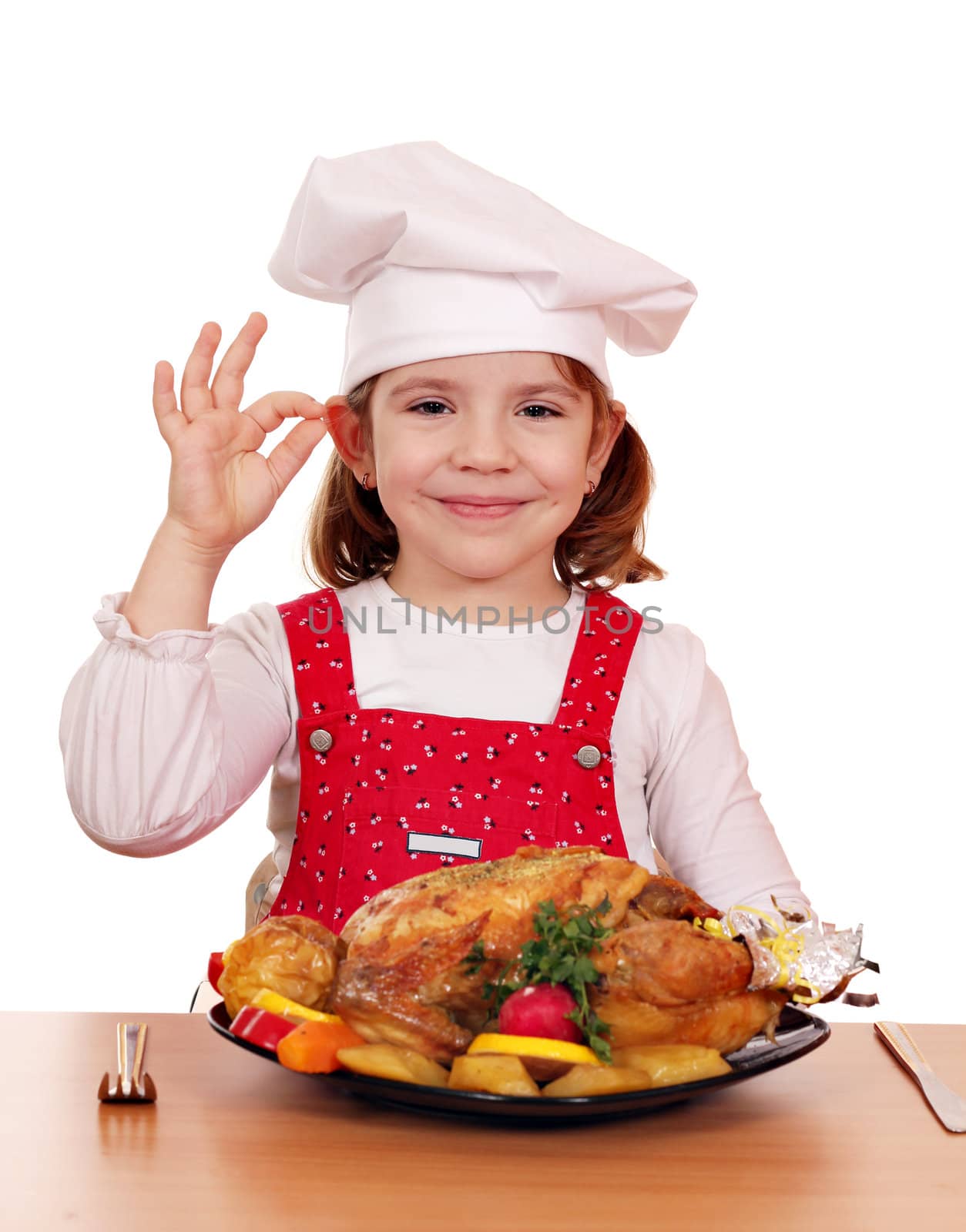 beautiful little girl cook with grilled chicken by goce