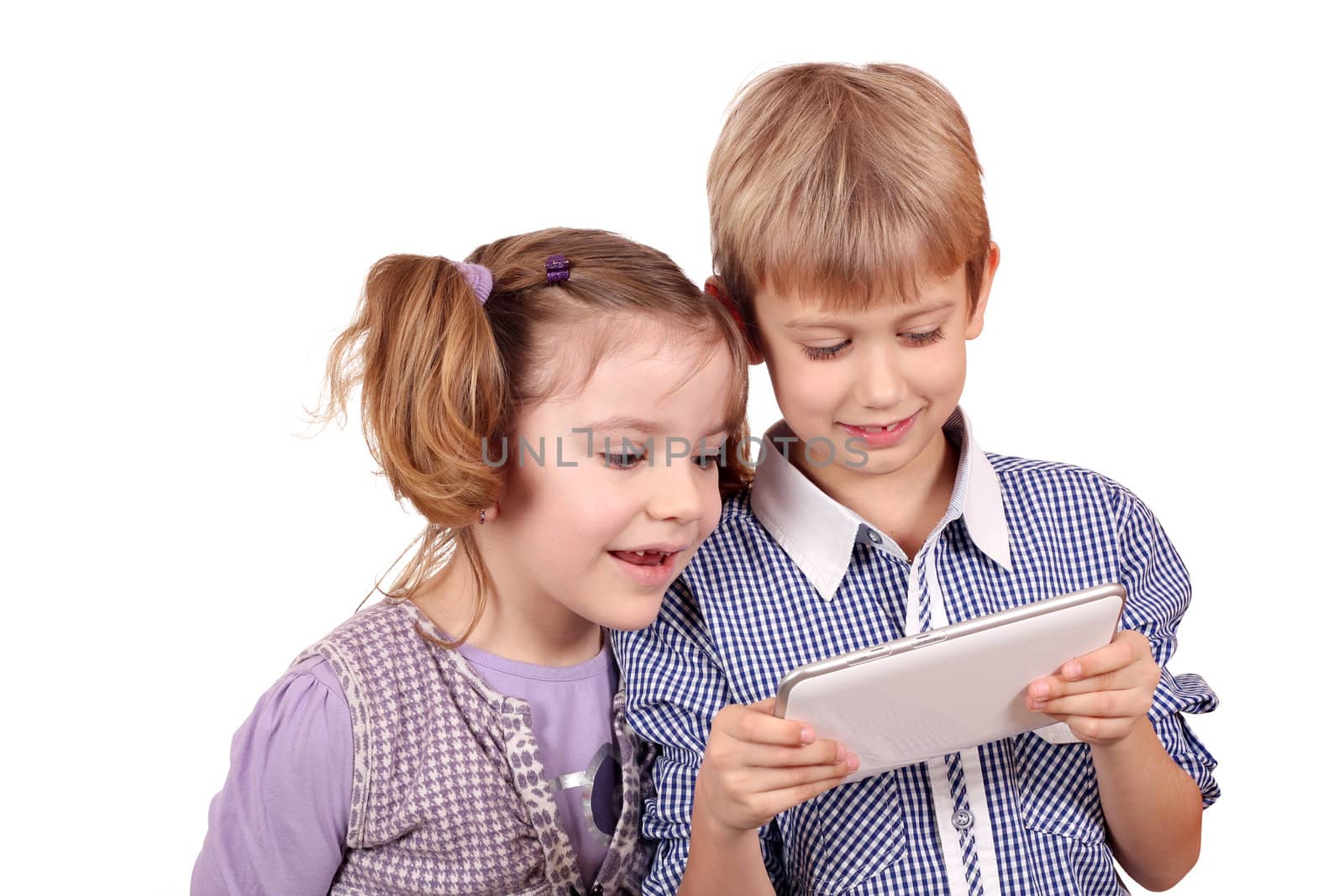 little girl and boy fun with tablet pc by goce