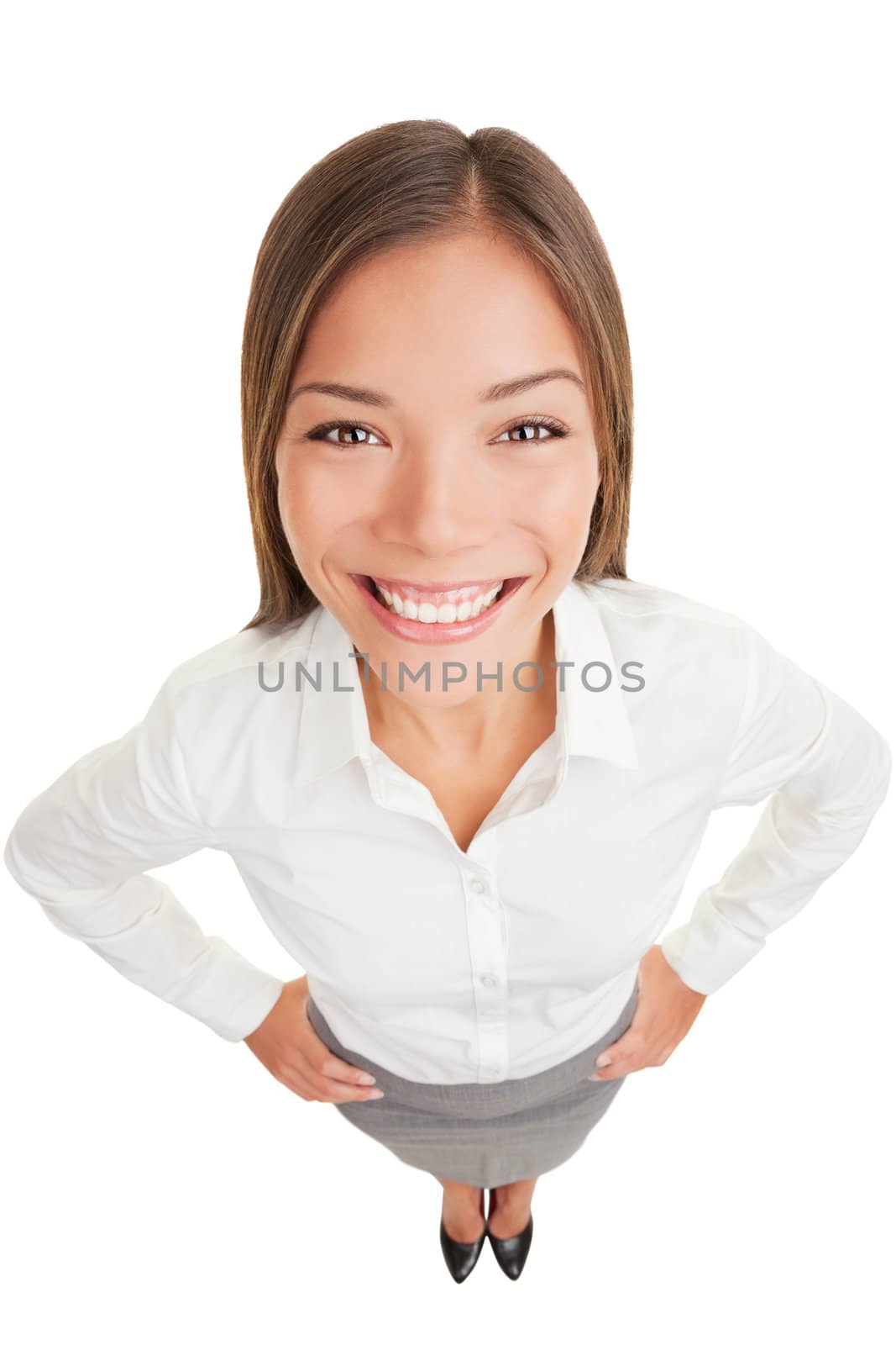Business woman portrait smiling. Happy businesswoman in high angle view isolated on white background. Mixed race ethnic Asian Chinese / Caucasian businesswoman standing in full length.