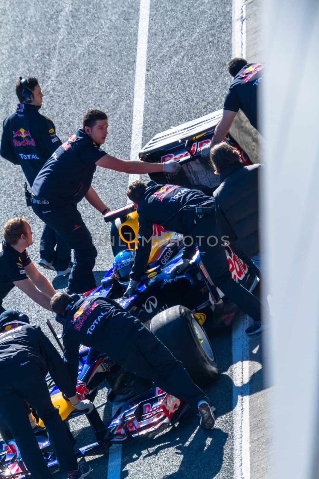 JEREZ DE LA FRONTERA, SPAIN - FEB 10: Sebastian Vettel of Red Bull F1 entering to the pit on training session on February 10 , 2012, in Jerez de la Frontera , Spain