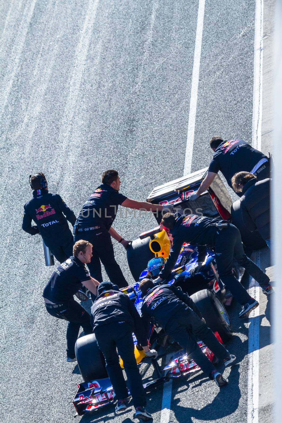 JEREZ DE LA FRONTERA, SPAIN - FEB 10: Sebastian Vettel of Red Bull F1 entering to the pit on training session on February 10 , 2012, in Jerez de la Frontera , Spain
