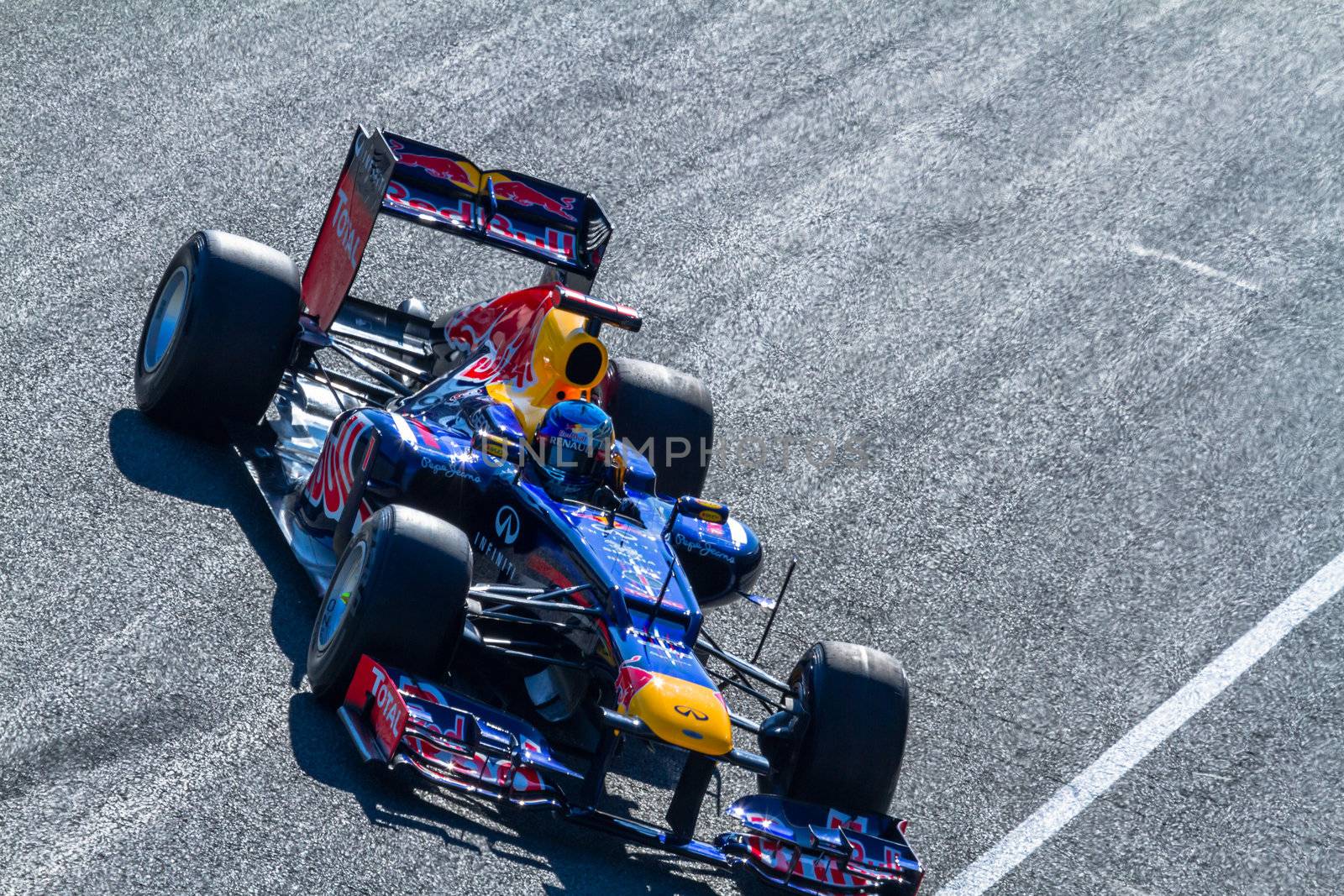 JEREZ DE LA FRONTERA, SPAIN - FEB 10: Sebastian Vettel of Red Bull F1 entering to the pit on training session on February 10 , 2012, in Jerez de la Frontera , Spain
