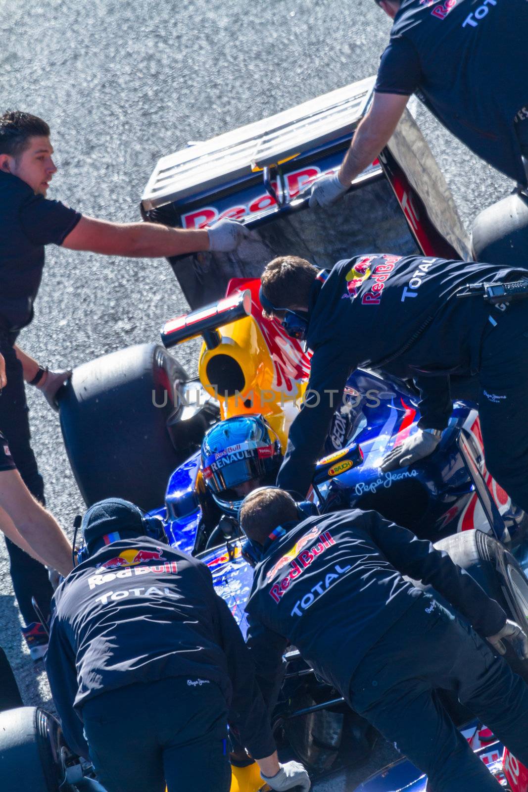 JEREZ DE LA FRONTERA, SPAIN - FEB 10: Sebastian Vettel of Red Bull F1 entering to the pit on training session on February 10 , 2012, in Jerez de la Frontera , Spain