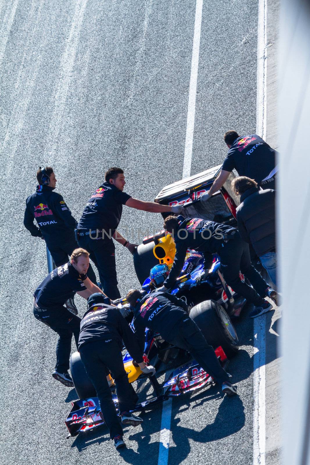 JEREZ DE LA FRONTERA, SPAIN - FEB 10: Sebastian Vettel of Red Bull F1 entering to the pit on training session on February 10 , 2012, in Jerez de la Frontera , Spain