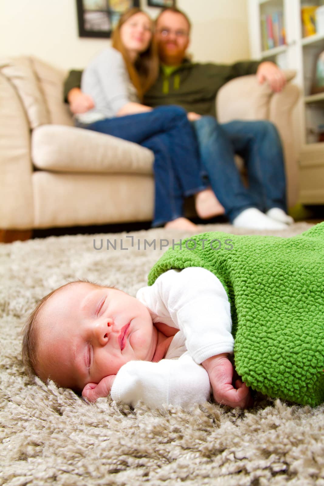 Parents with Newborn Baby Boy by joshuaraineyphotography