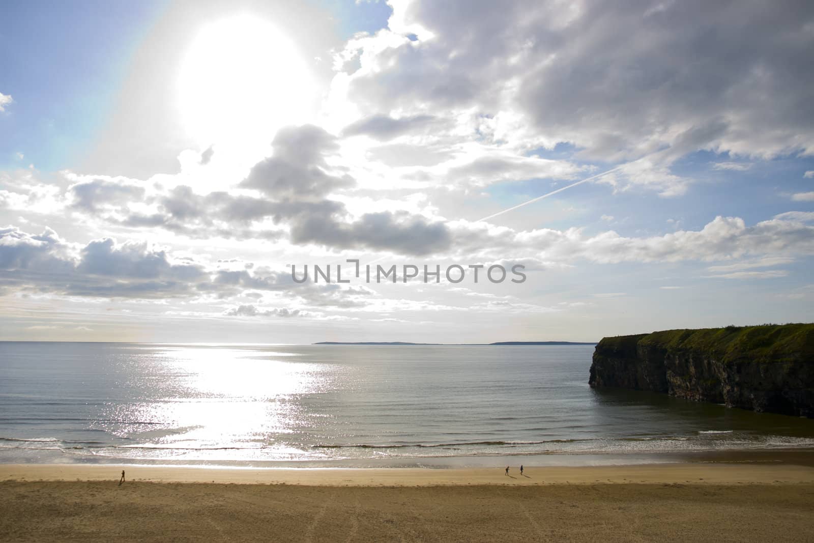 Beautiful bright sun over the Ballybunion beach and cliffs in Ireland on a summers day