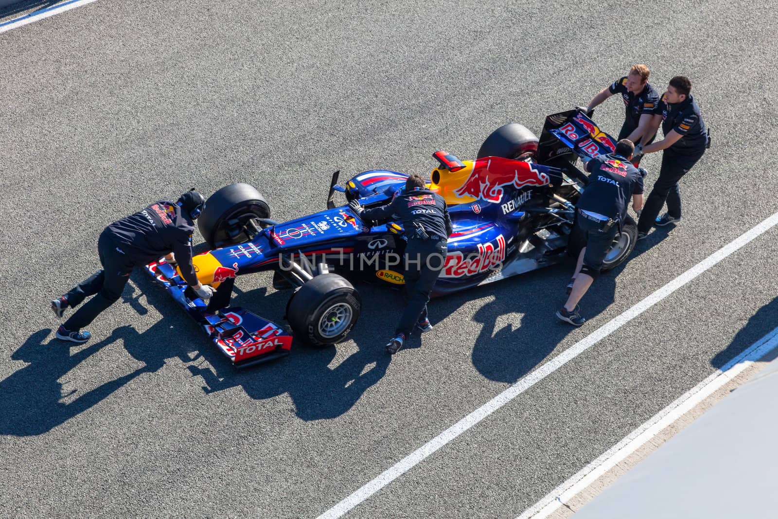 JEREZ DE LA FRONTERA, SPAIN - FEB 10: Sebastian Vettel of Red Bull F1 entering to the pit on training session on February 10 , 2012, in Jerez de la Frontera , Spain
