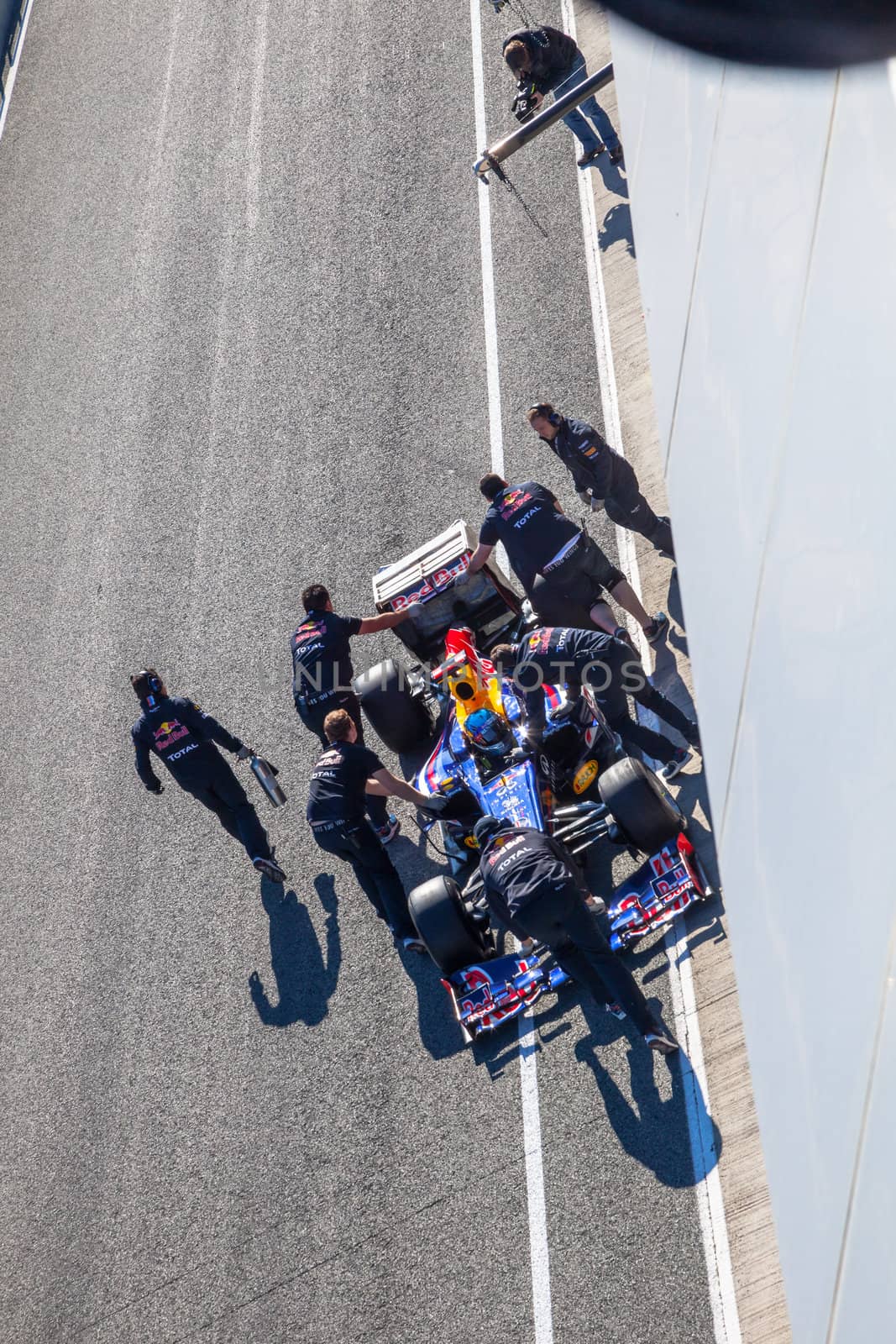 JEREZ DE LA FRONTERA, SPAIN - FEB 10: Sebastian Vettel of Red Bull F1 entering to the pit on training session on February 10 , 2012, in Jerez de la Frontera , Spain