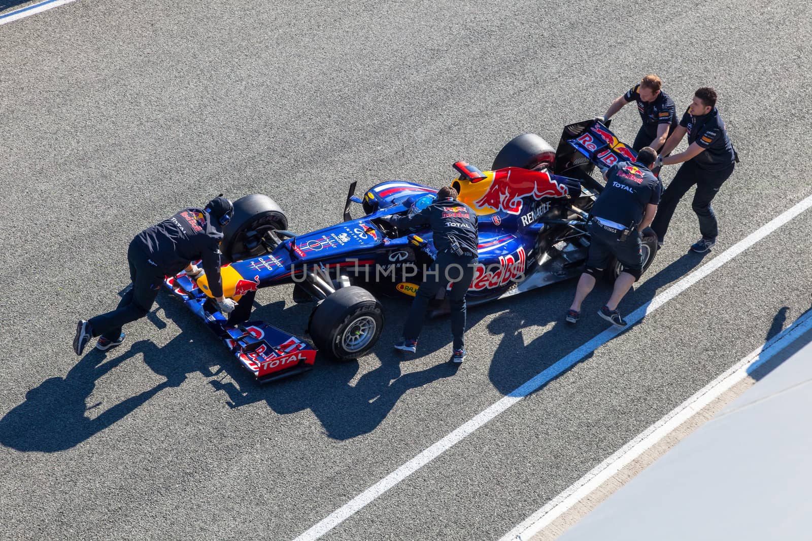 JEREZ DE LA FRONTERA, SPAIN - FEB 10: Sebastian Vettel of Red Bull F1 entering to the pit on training session on February 10 , 2012, in Jerez de la Frontera , Spain
