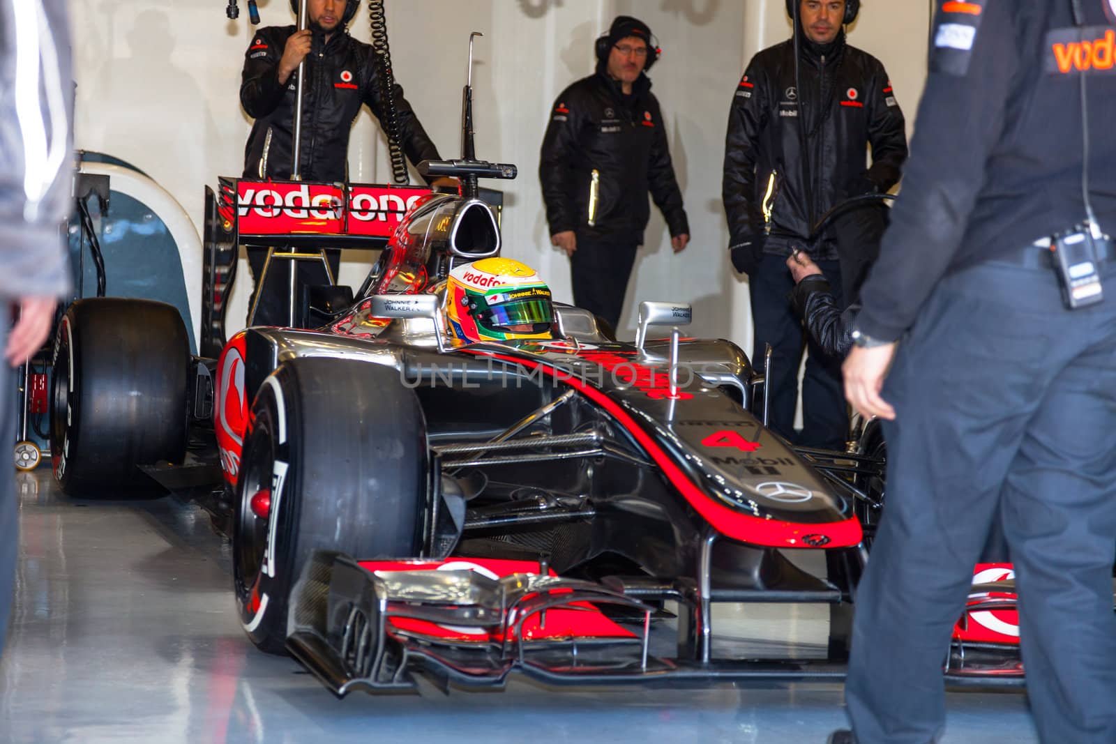 JEREZ DE LA FRONTERA, SPAIN - FEB 10: Lewis Hamilton of McLaren F1 waiting on the pit on training session on February 10 , 2012, in Jerez de la Frontera , Spain
