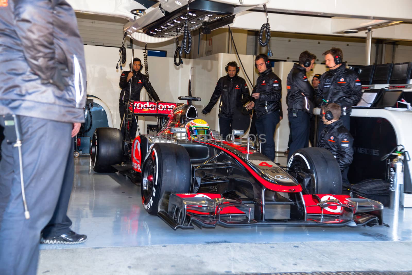 JEREZ DE LA FRONTERA, SPAIN - FEB 10: Lewis Hamilton of McLaren F1 waiting on the pit on training session on February 10 , 2012, in Jerez de la Frontera , Spain