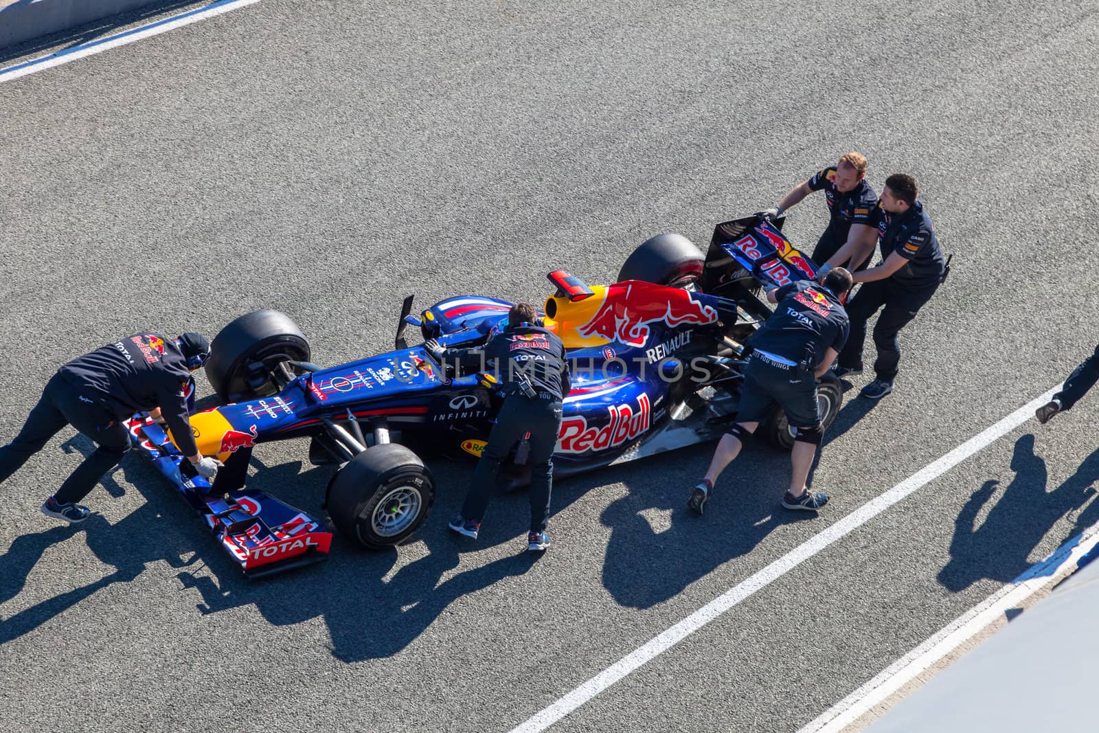JEREZ DE LA FRONTERA, SPAIN - FEB 10: Sebastian Vettel of Red Bull F1 entering to the pit on training session on February 10 , 2012, in Jerez de la Frontera , Spain