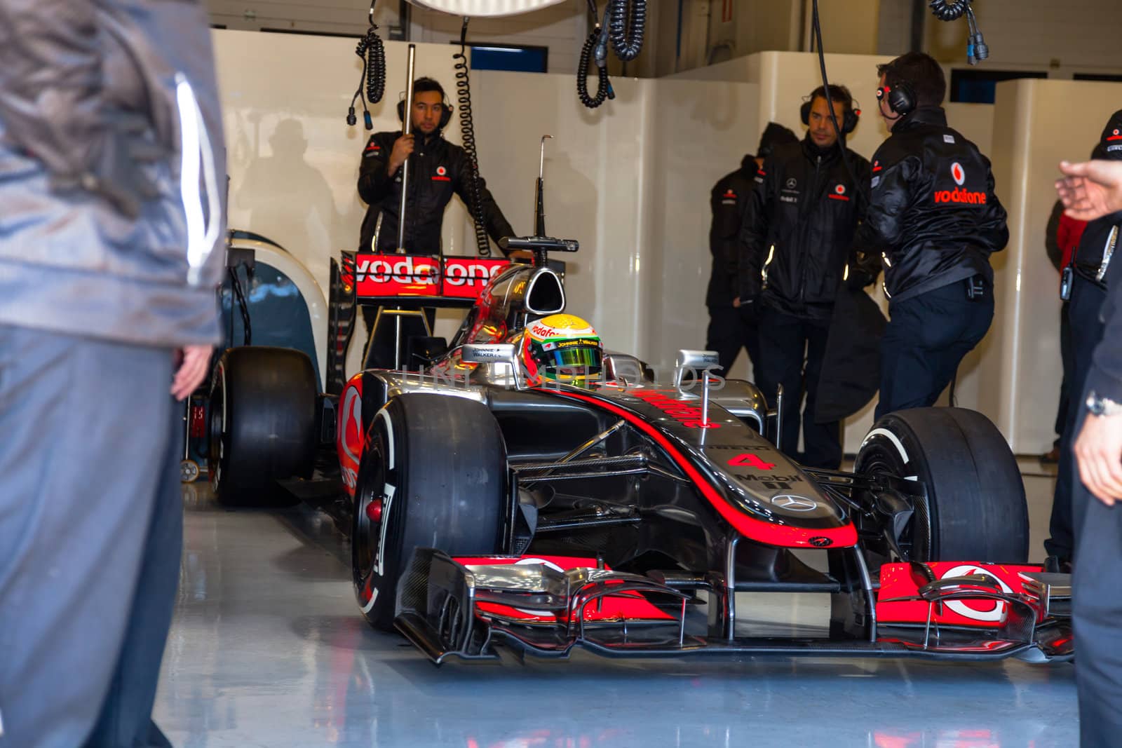 JEREZ DE LA FRONTERA, SPAIN - FEB 10: Lewis Hamilton of McLaren F1 waiting on the pit on training session on February 10 , 2012, in Jerez de la Frontera , Spain