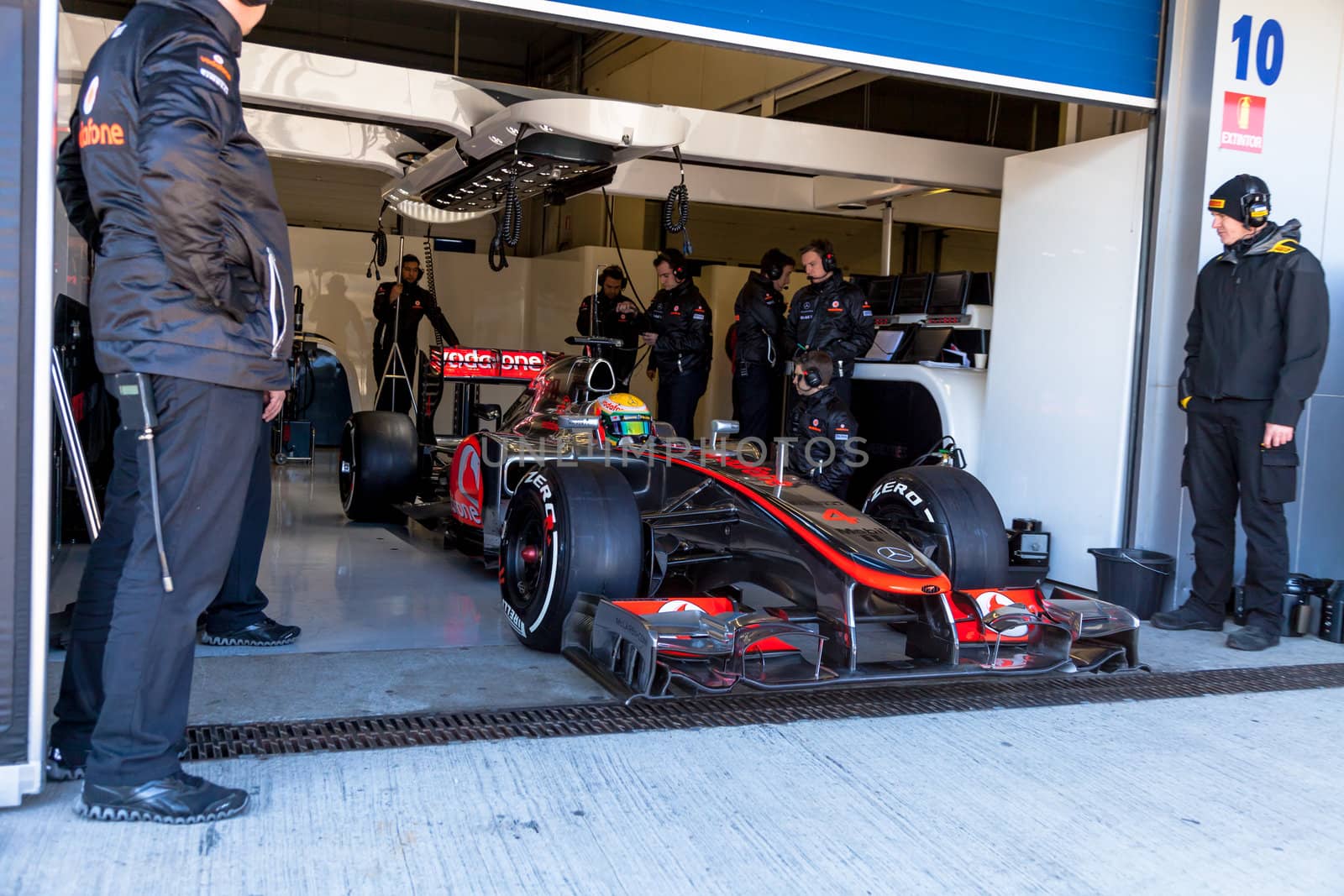 JEREZ DE LA FRONTERA, SPAIN - FEB 10: Lewis Hamilton of McLaren F1 waiting on the pit on training session on February 10 , 2012, in Jerez de la Frontera , Spain