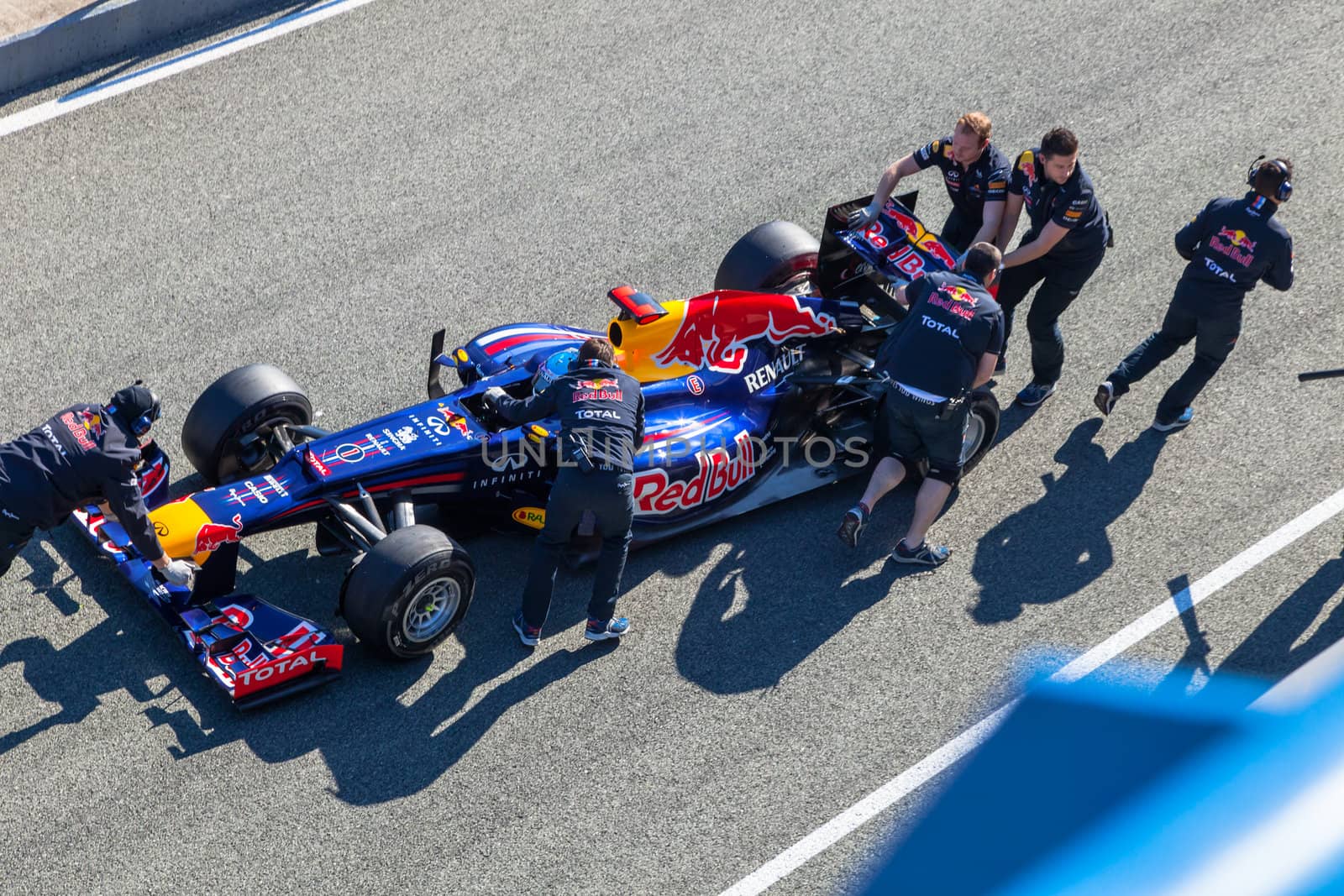 JEREZ DE LA FRONTERA, SPAIN - FEB 10: Sebastian Vettel of Red Bull F1 entering to the pit on training session on February 10 , 2012, in Jerez de la Frontera , Spain