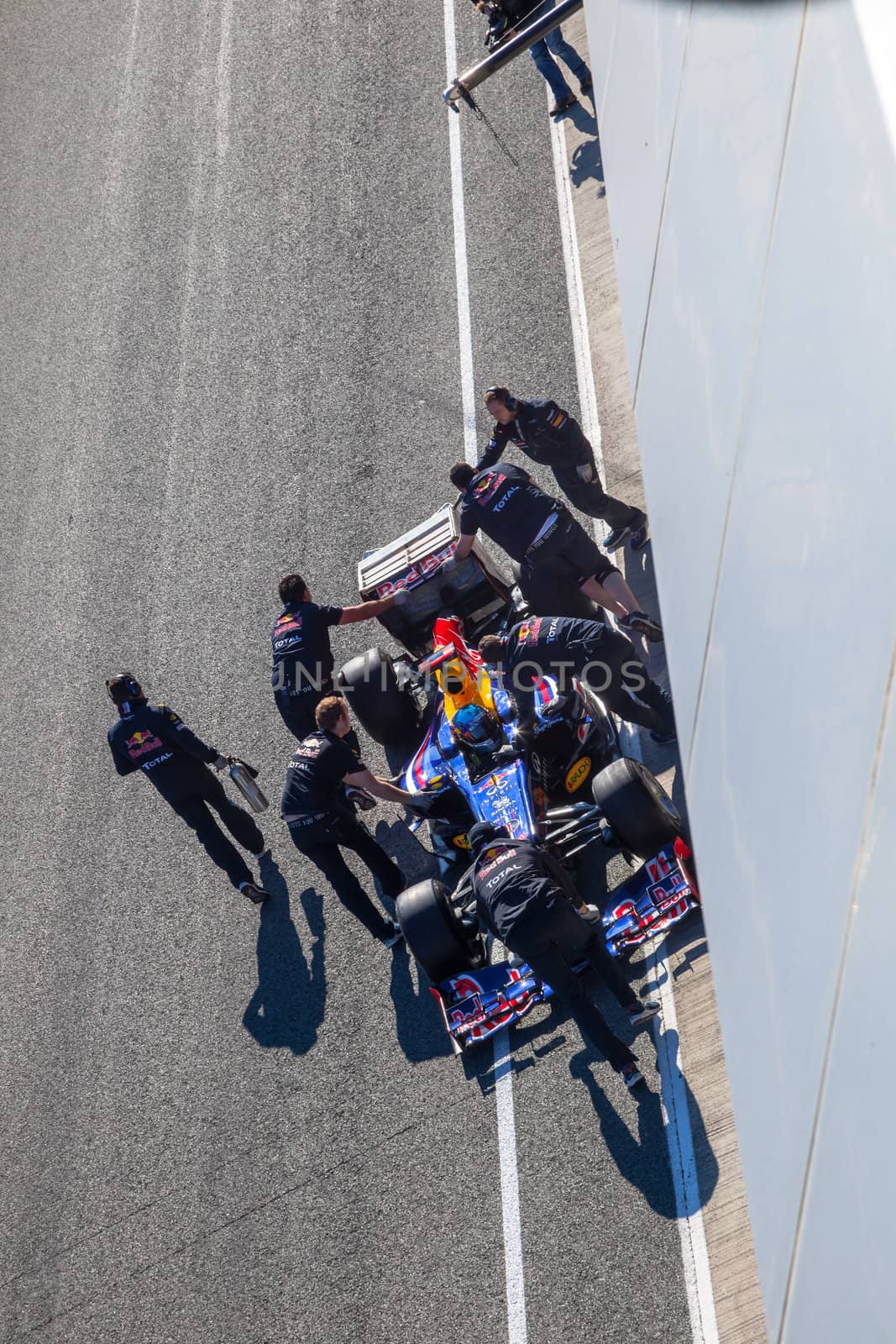 JEREZ DE LA FRONTERA, SPAIN - FEB 10: Sebastian Vettel of Red Bull F1 entering to the pit on training session on February 10 , 2012, in Jerez de la Frontera , Spain