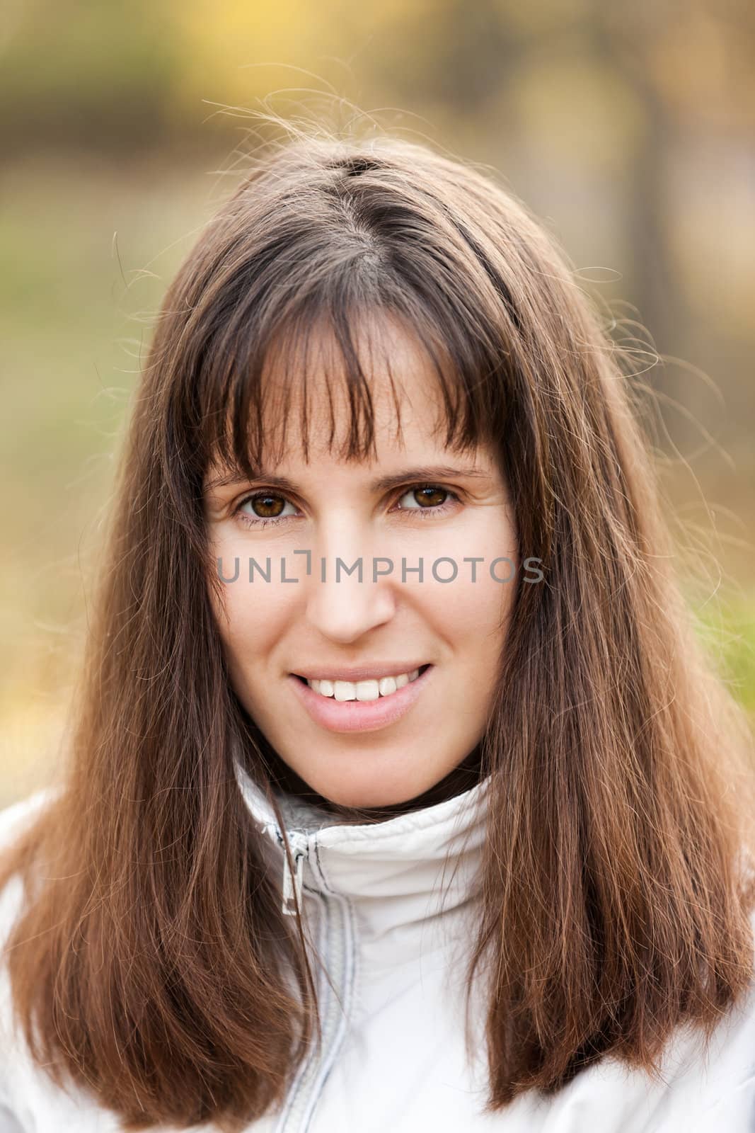 Beauty young smiling caucasian woman walking outdoor