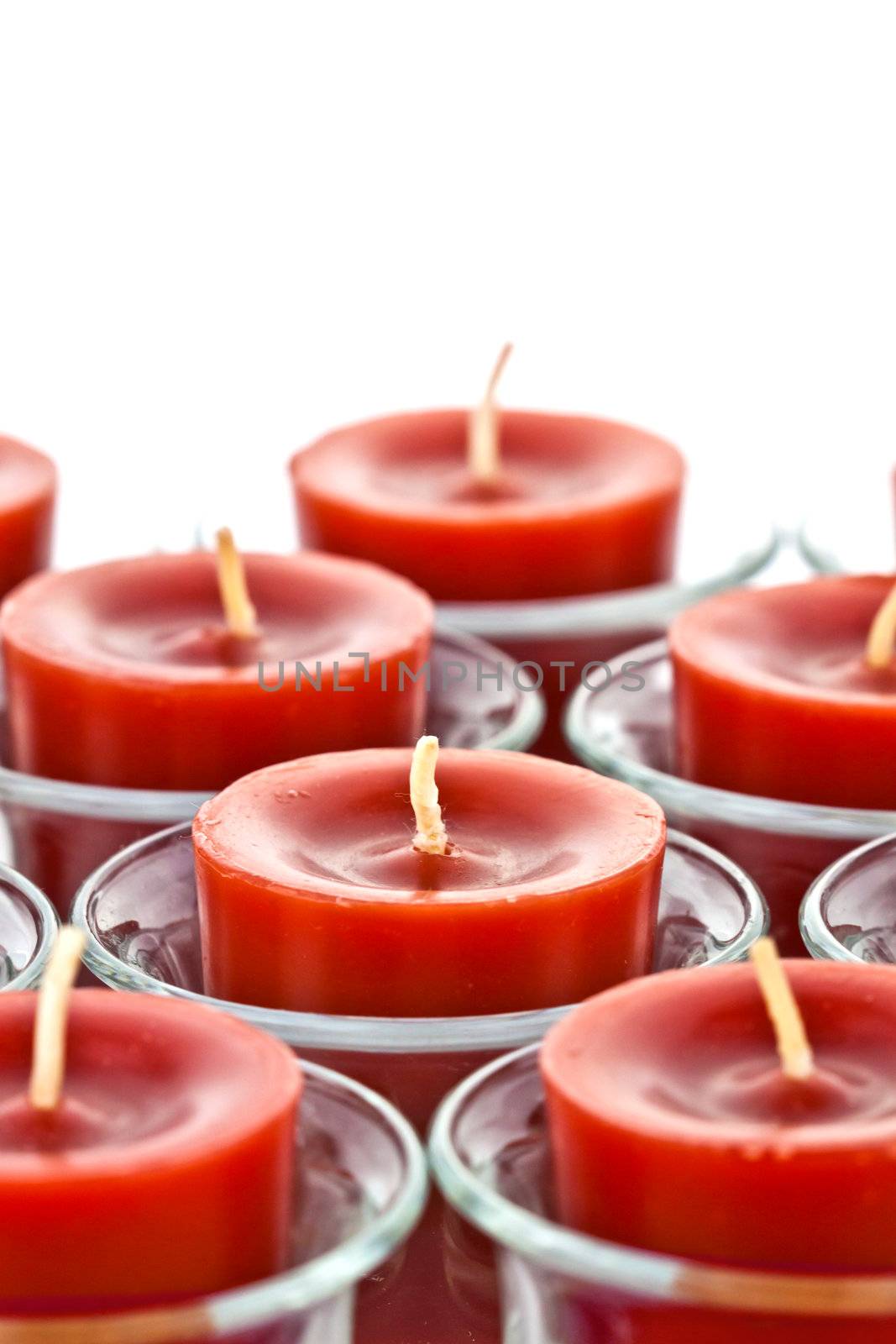 red candles on the glass candle holder