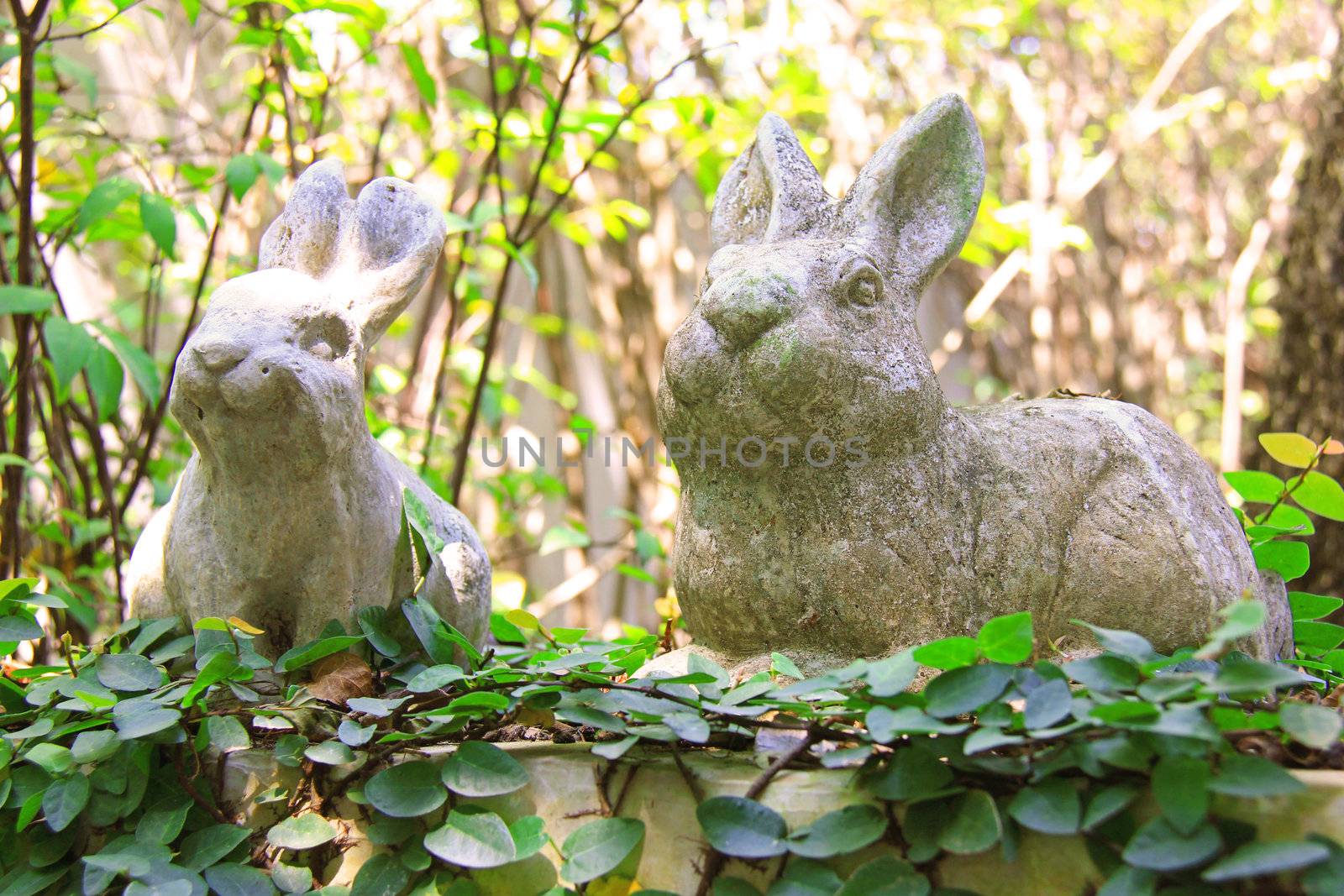 Statue of rabbits in the garden by nuchylee