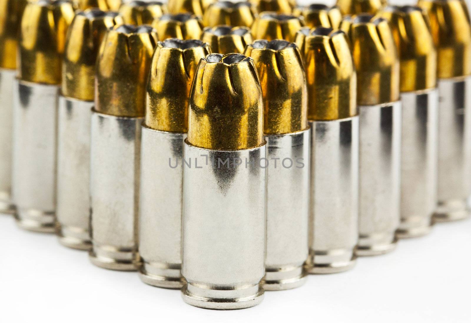 9 mm bullets on a white background isolated