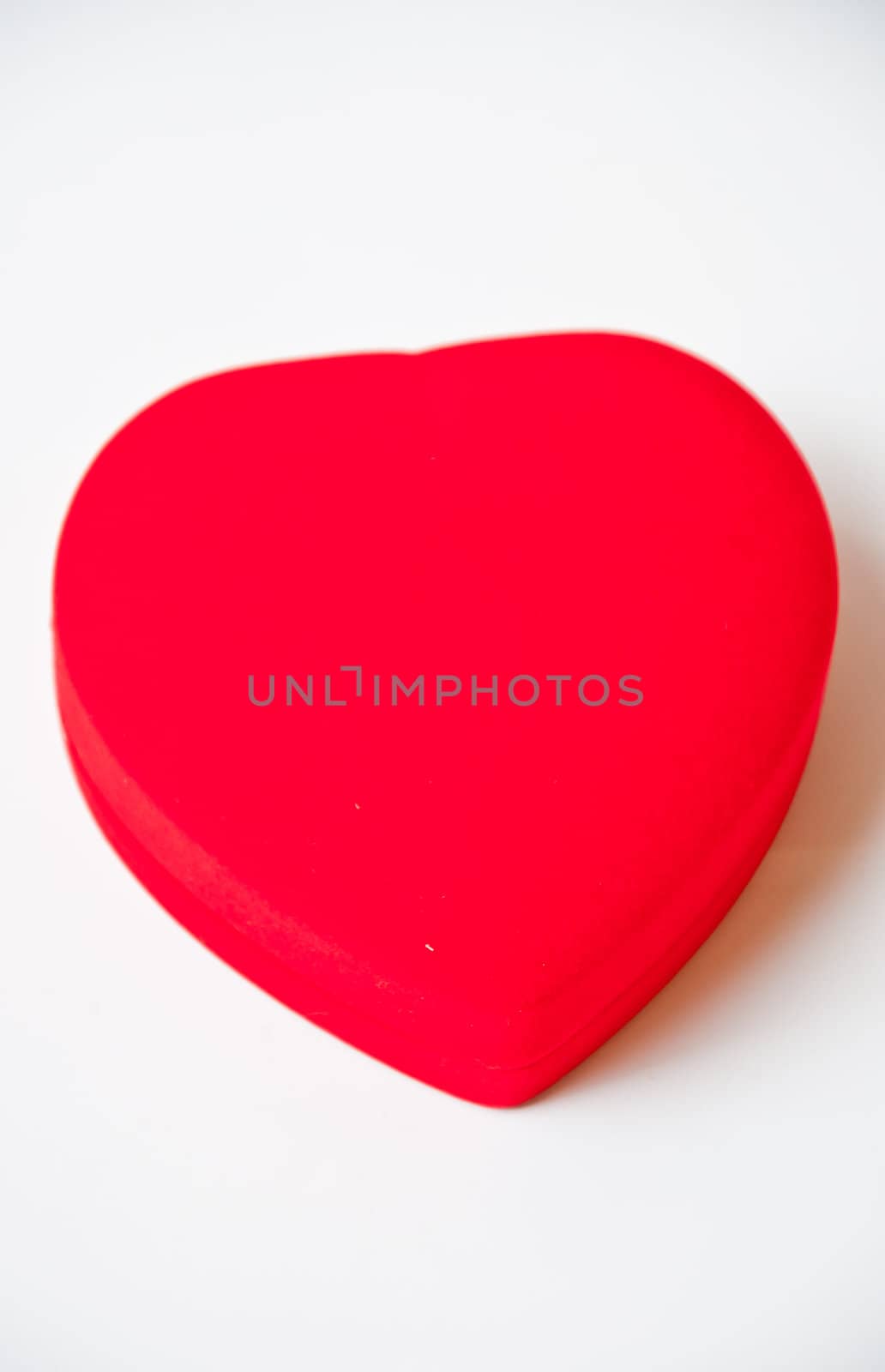 Red heart shape on white background by buffaloboy