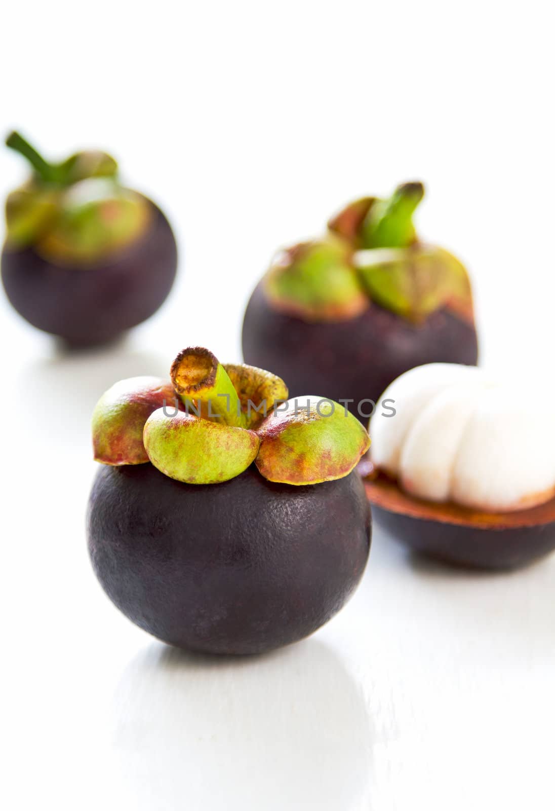Fresh Mangosteen [tropical fruit which originated in asia ]