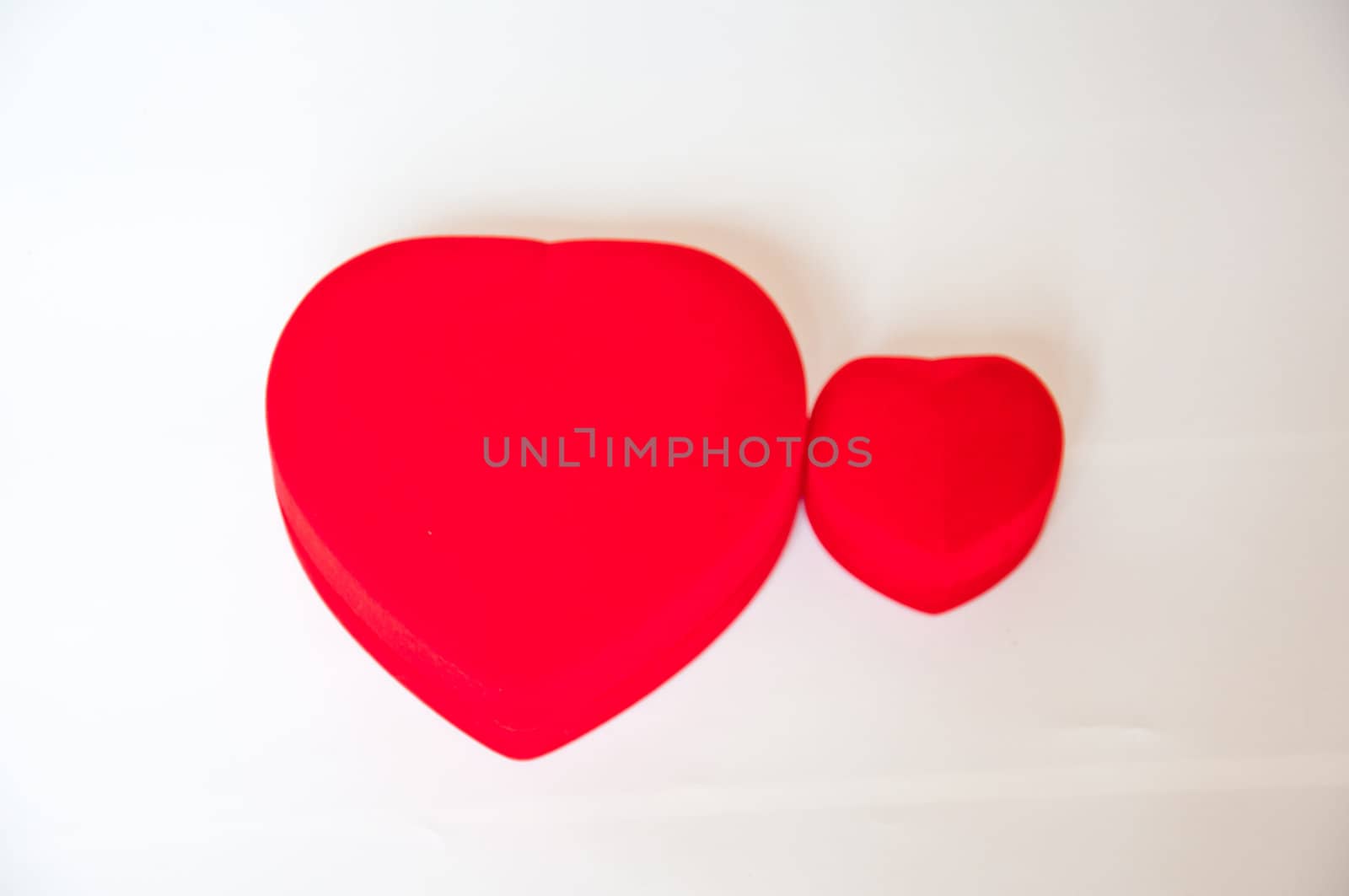 Red heart shape on white background by buffaloboy