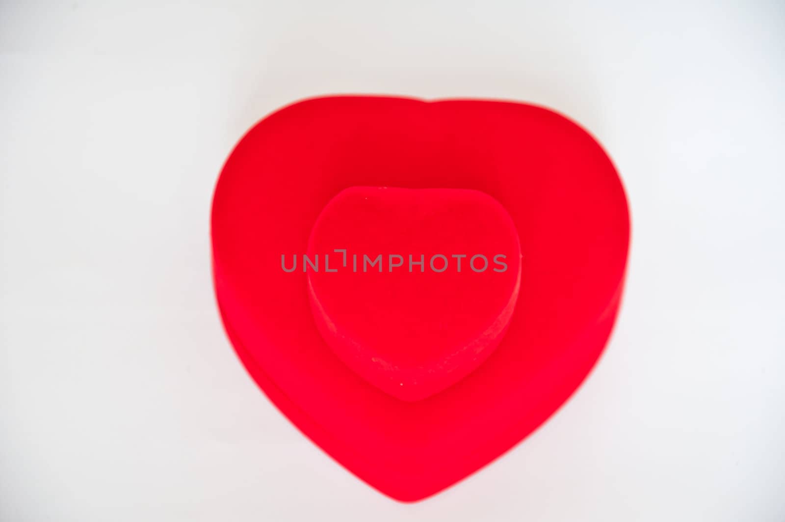 Red heart shape on white background by buffaloboy