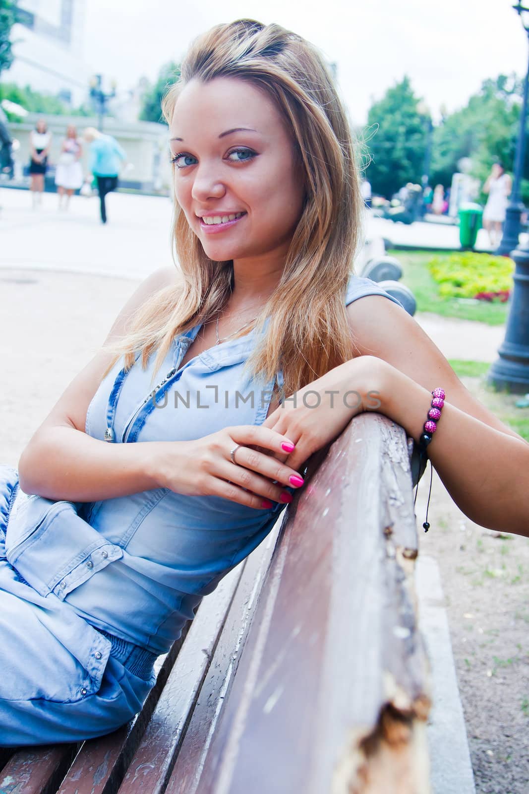 Young and beautiful woman relaxing in the park