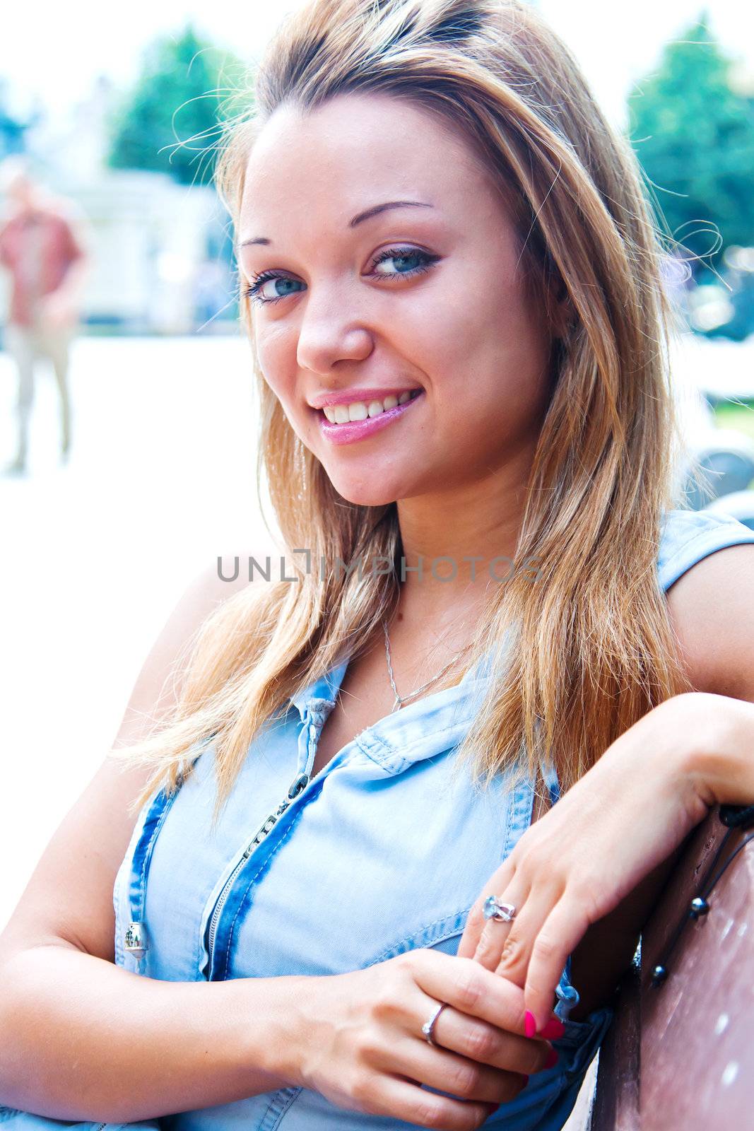 Young and beautiful woman relaxing in the park