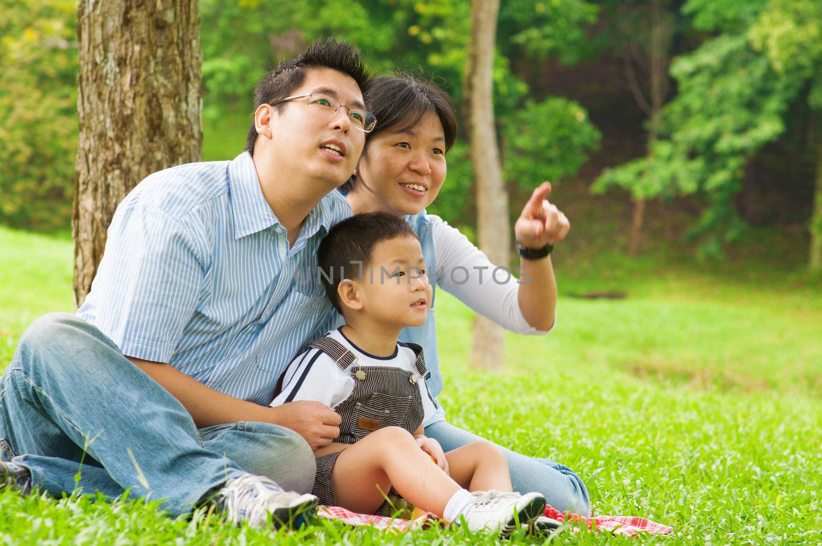 Asian Chinese family having fun at outdoor park