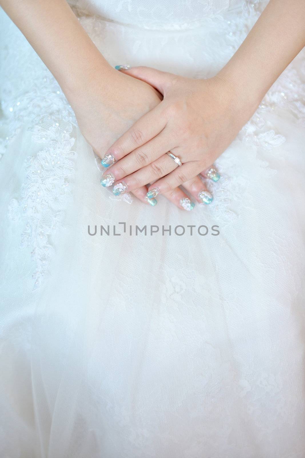 Close up beautiful bride's hands in wedding day.