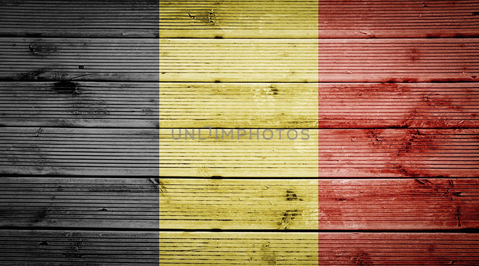 Natural wood planks texture background with the colors of the flag of Belgium