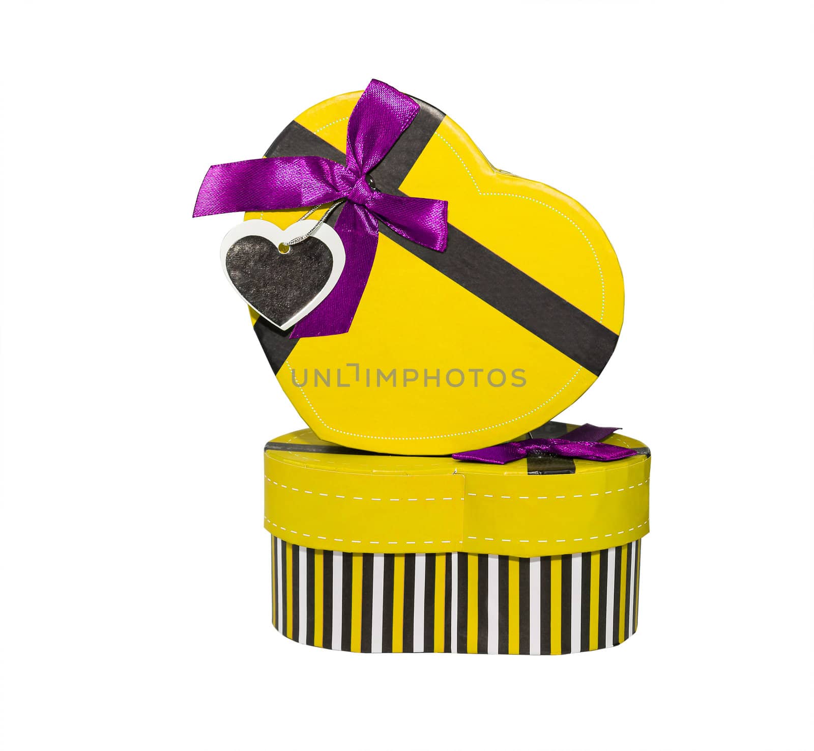 Yellow Heart shaped box in heart shape on white background