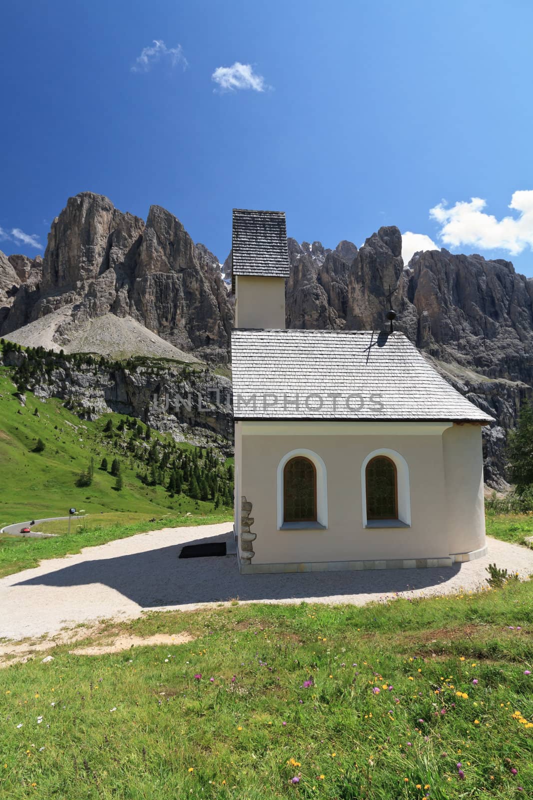 small chapel  in Gardena pass, Italy. On background Sella mount