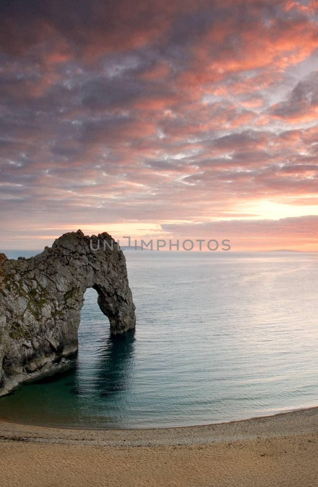Sunset at the famous rock arch in Dorset