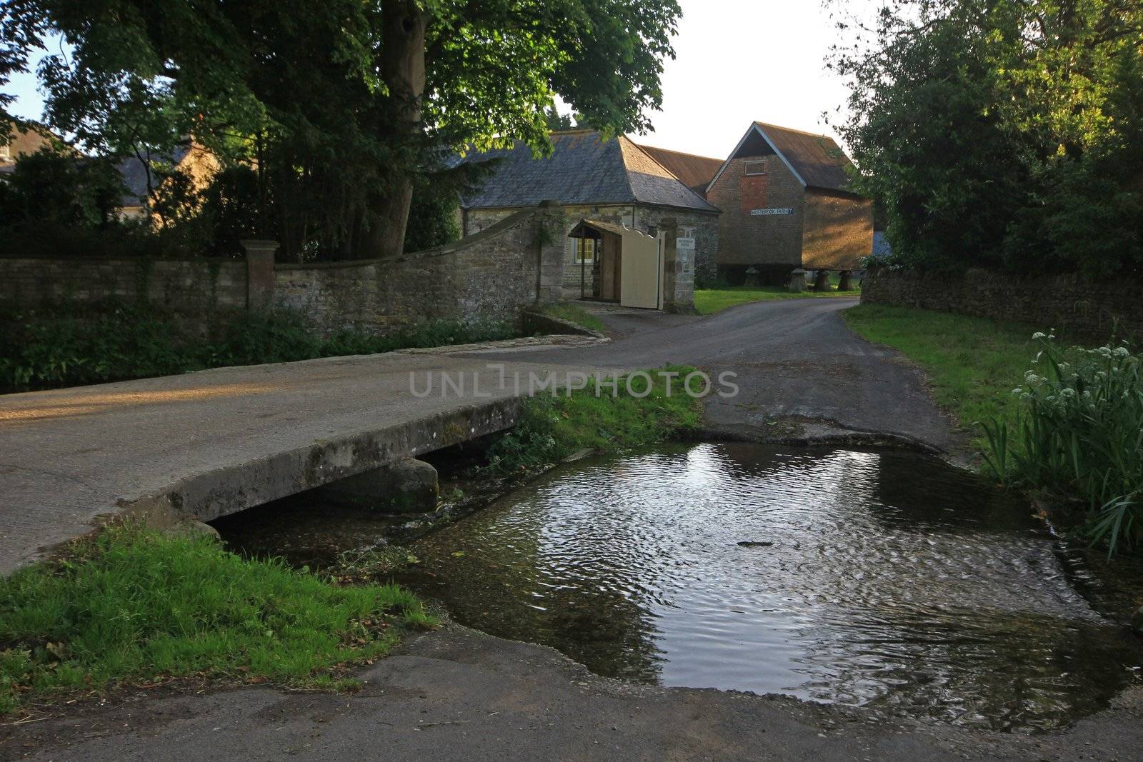 Over the stream into the farm court yard